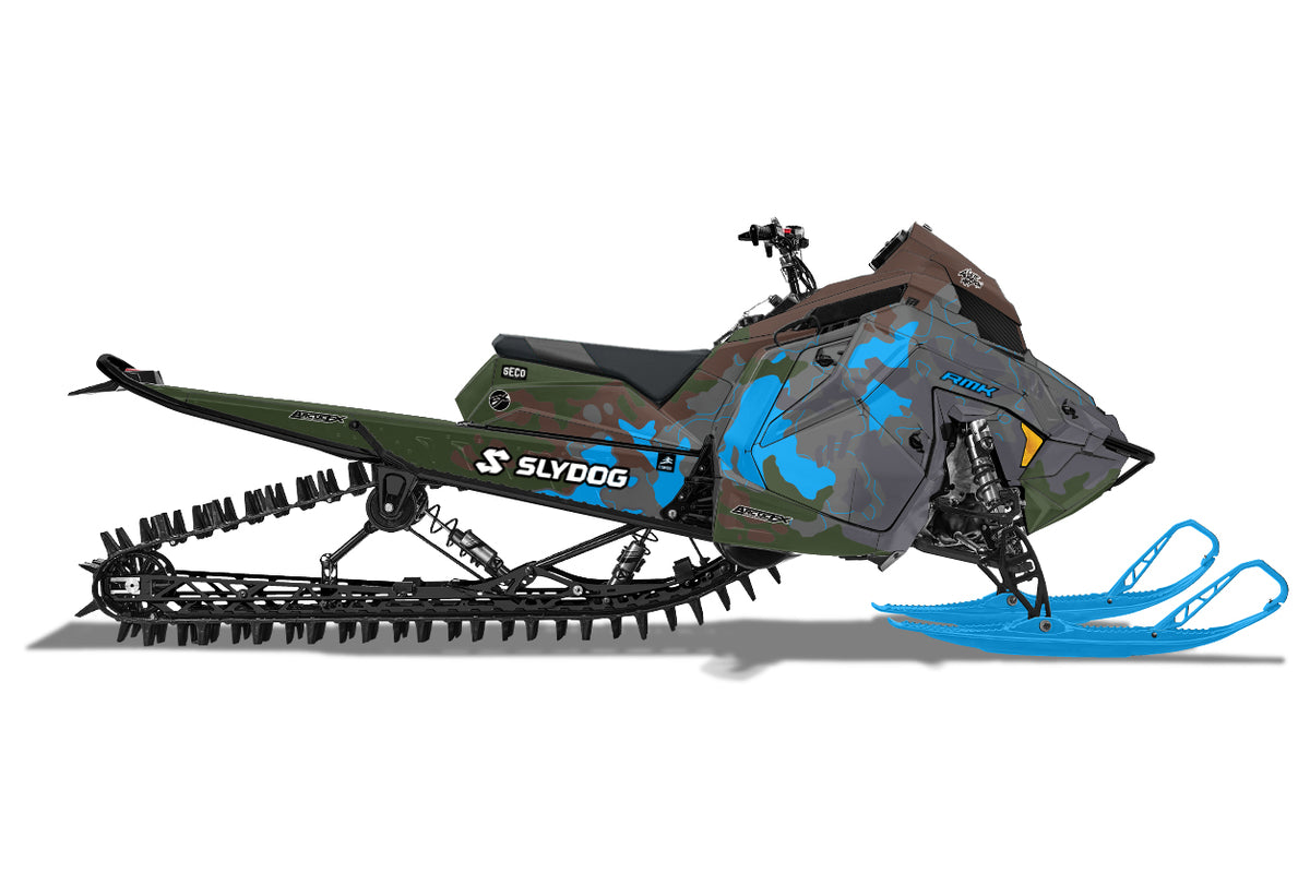 A side view of a Polaris snowmobile with a custom camouflage wrap featuring green, gray, and blue camo patterns, black tracks, and bright blue skis on a white background.