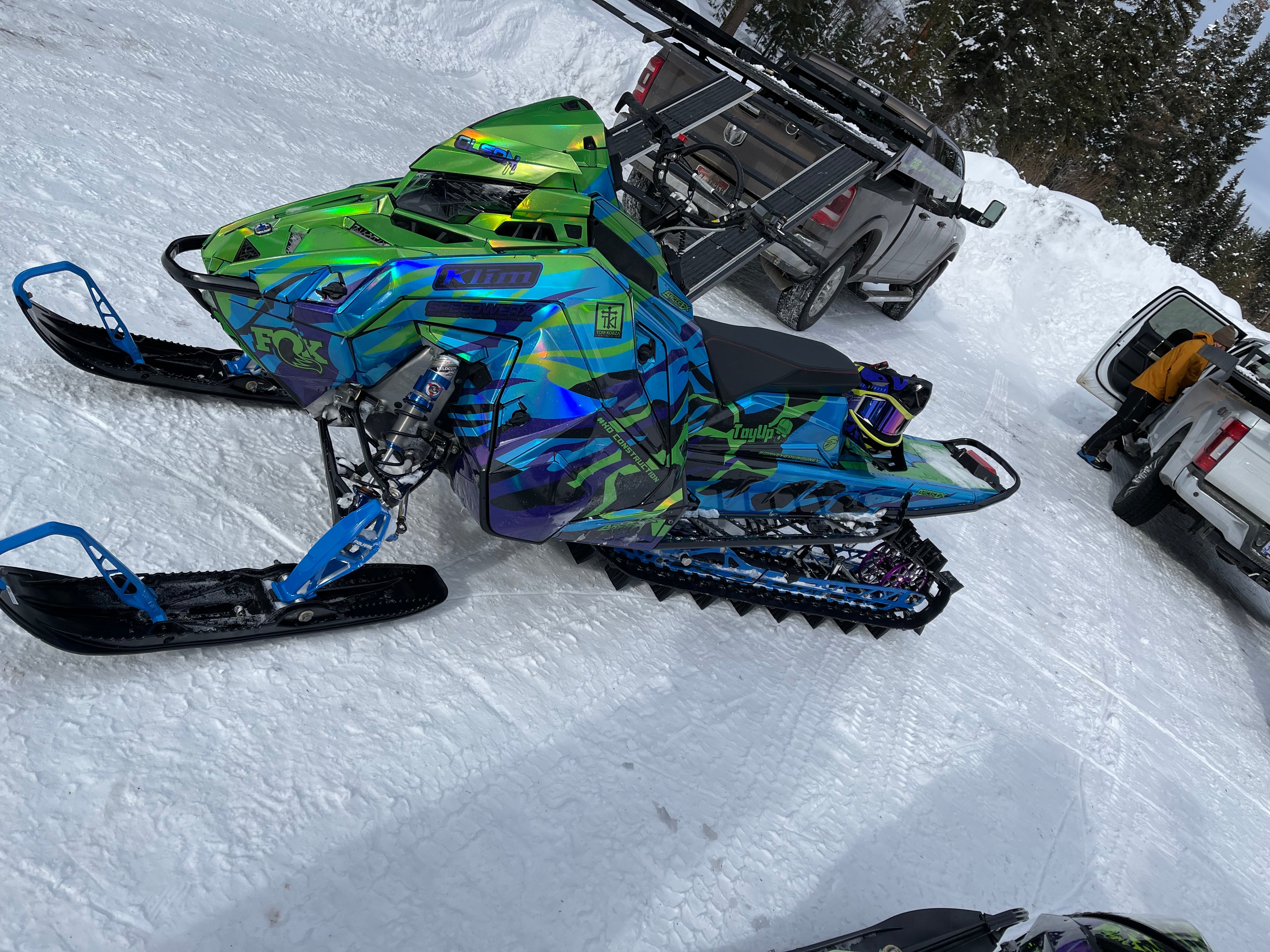 Colorful snowmobile on a snowy surface