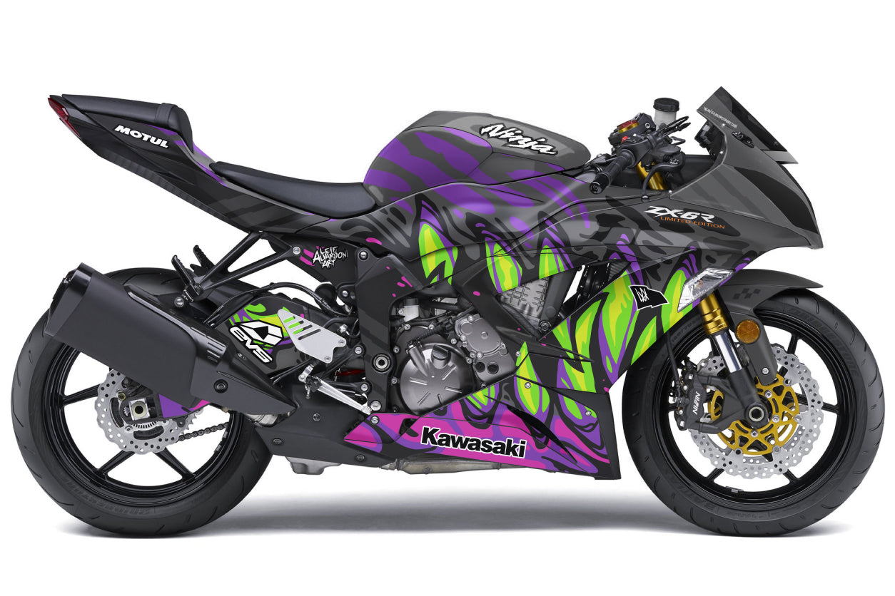 A Kawasaki Ninja 636 ZX6-R motorcycle shown in a side profile on a clean white background. The bike features a custom graphic wrap with a black base, vibrant purple flame patterns, neon green accents, and gold-colored front fork springs.