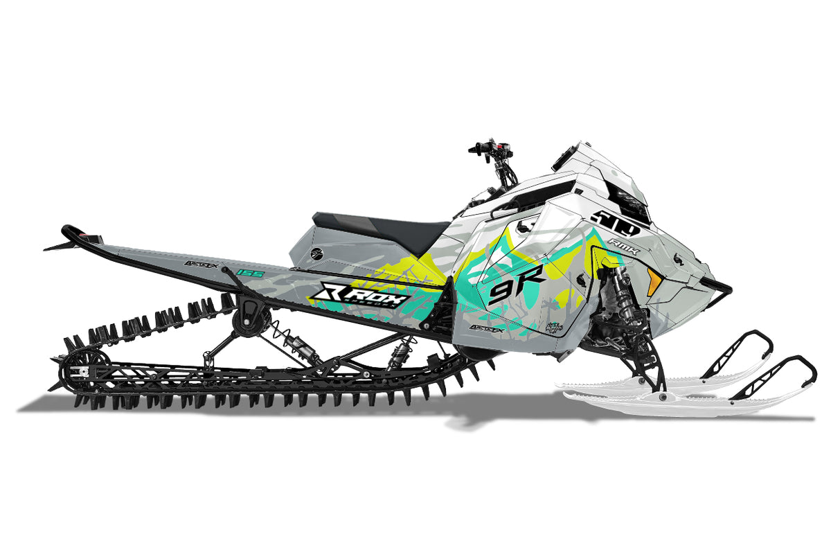 A side profile view of a Polaris snowmobile, specifically a Polaris Matryx Mountain Patriot Boost Pro-RMK 155, featuring a custom Sled Wrap in white, black, lime green, and yellow on a solid white background.